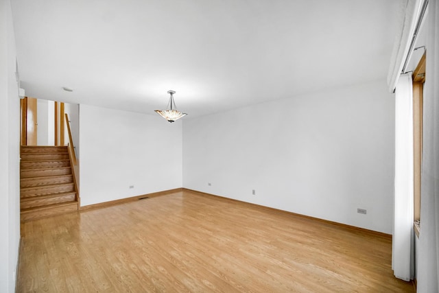 empty room featuring light hardwood / wood-style floors