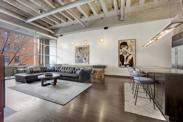 living area with dark wood-style flooring