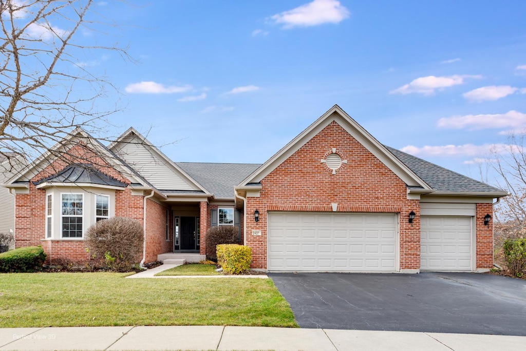 front facade with a garage and a front lawn