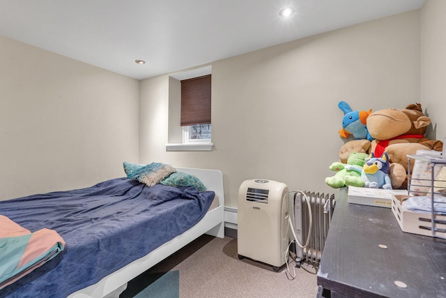 carpeted bedroom with a baseboard heating unit and radiator