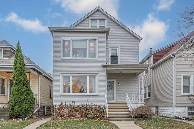 view of front of home with a front lawn