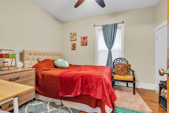 bedroom featuring ceiling fan and light wood-type flooring