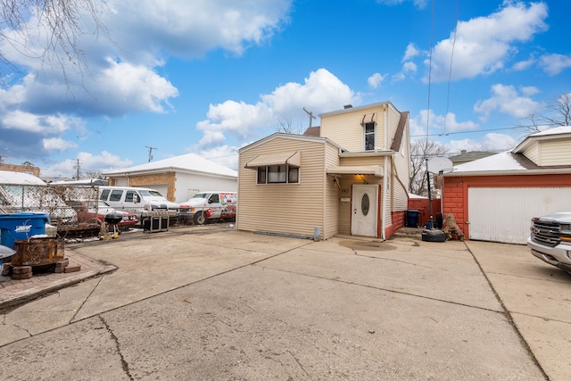 exterior space with a garage