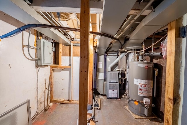 utility room with heating unit, electric panel, and water heater