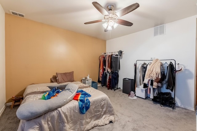 bedroom featuring light carpet and ceiling fan