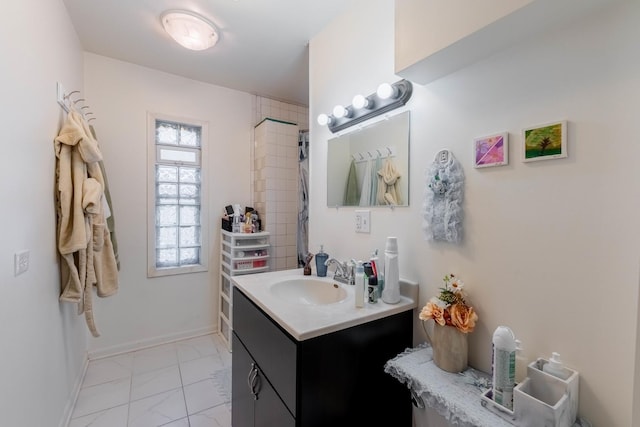 bathroom featuring vanity and curtained shower