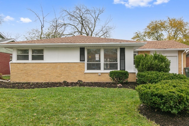 view of side of home featuring a yard