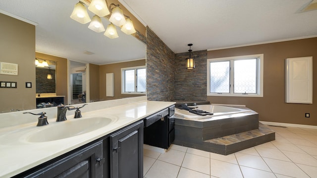 bathroom with tile patterned flooring, plenty of natural light, a textured ceiling, and vanity