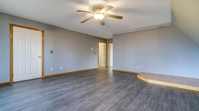 unfurnished room with ceiling fan and dark hardwood / wood-style flooring