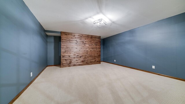 2239 Pine Bluff Dr, Dixon, IL 61021 - carpeted spare room featuring wood walls and baseboards