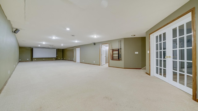 interior space featuring french doors and light colored carpet