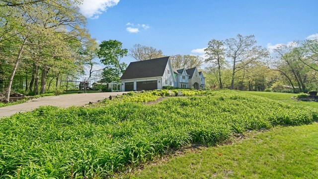 2239 Pine Bluff Dr, Dixon, IL 61021 - view of property exterior featuring driveway