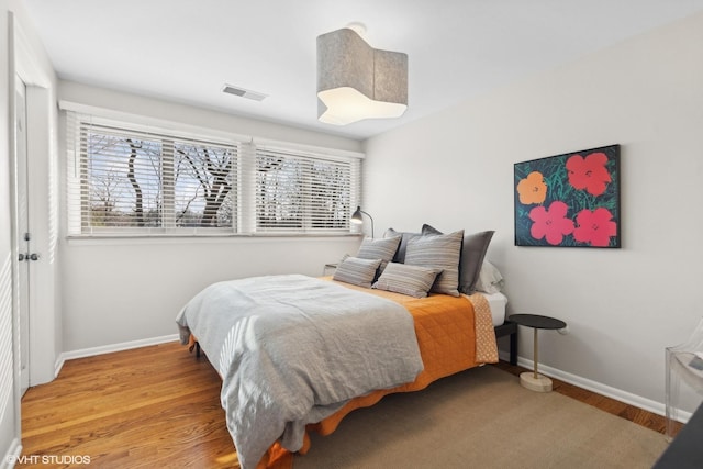 bedroom featuring hardwood / wood-style floors