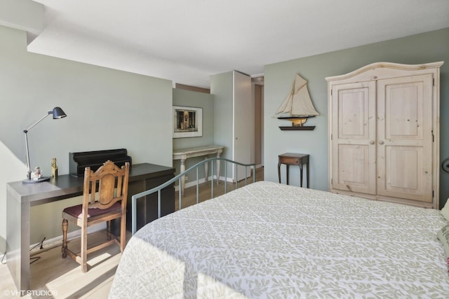 bedroom featuring light hardwood / wood-style floors