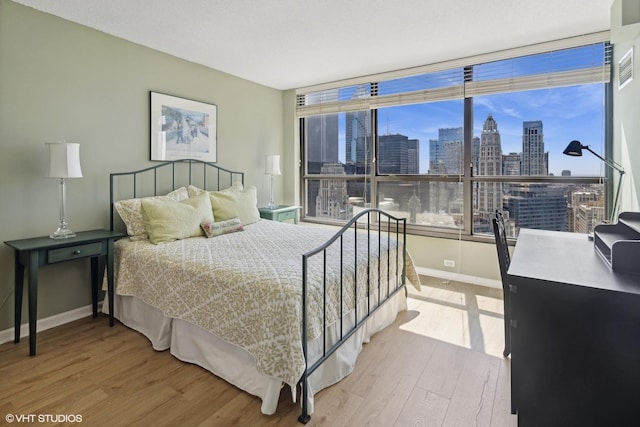 bedroom featuring light hardwood / wood-style floors