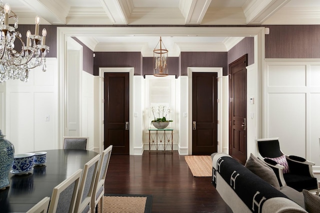 interior space with ornamental molding, a decorative wall, a chandelier, and beam ceiling