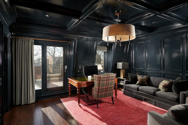 office area featuring a wealth of natural light, a decorative wall, beam ceiling, and coffered ceiling
