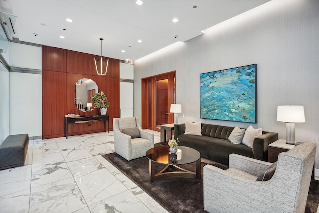 living room featuring wooden walls