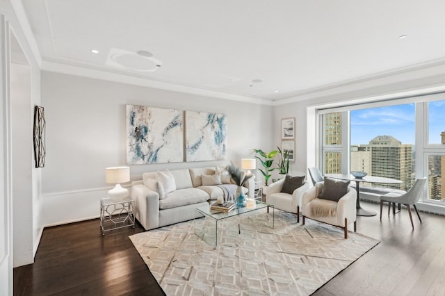 living room featuring hardwood / wood-style floors and ornamental molding