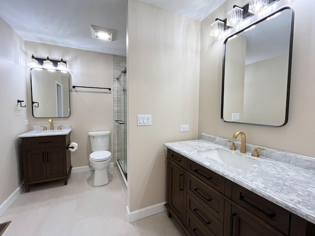 bathroom featuring an enclosed shower, vanity, toilet, and tile patterned floors