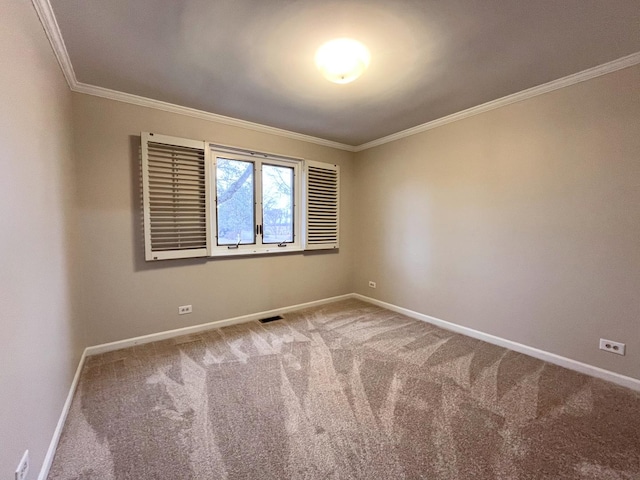 carpeted empty room with crown molding