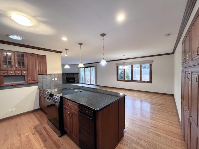 kitchen featuring electric range, tasteful backsplash, dark stone countertops, light hardwood / wood-style floors, and ornamental molding