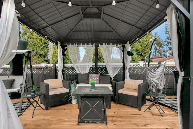 wooden terrace with a gazebo