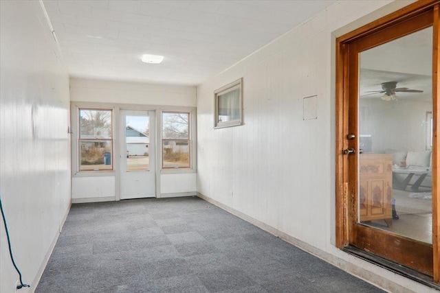 unfurnished room with light carpet and ceiling fan