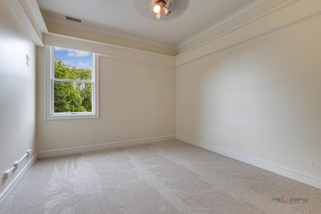 unfurnished room featuring carpet flooring and crown molding