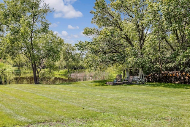 view of yard with a water view