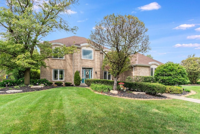 view of front of home with a front yard