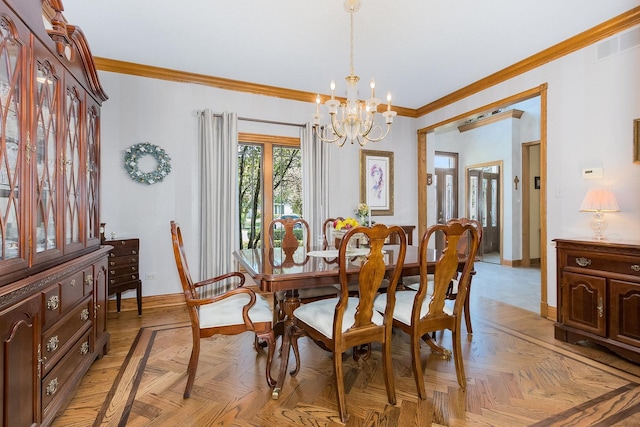 dining room featuring light parquet floors, ornamental molding, and a notable chandelier