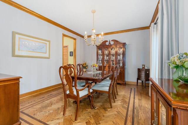 dining area featuring light parquet flooring, ornamental molding, and an inviting chandelier