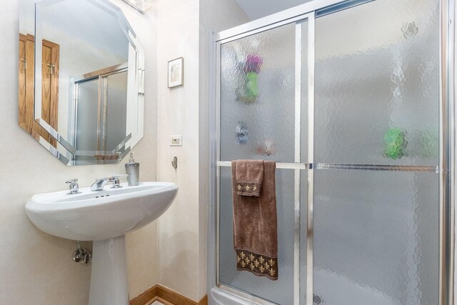 bathroom with an enclosed shower