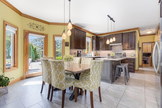 tiled dining area with ornamental molding