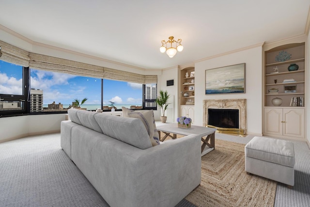 living room with ornamental molding, light colored carpet, built in features, and a high end fireplace