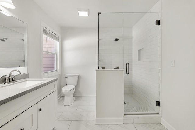 bathroom featuring toilet, walk in shower, and vanity