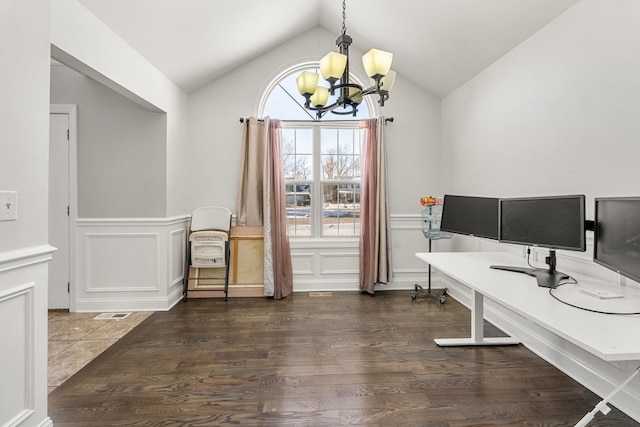 office area with lofted ceiling, a notable chandelier, and dark hardwood / wood-style flooring