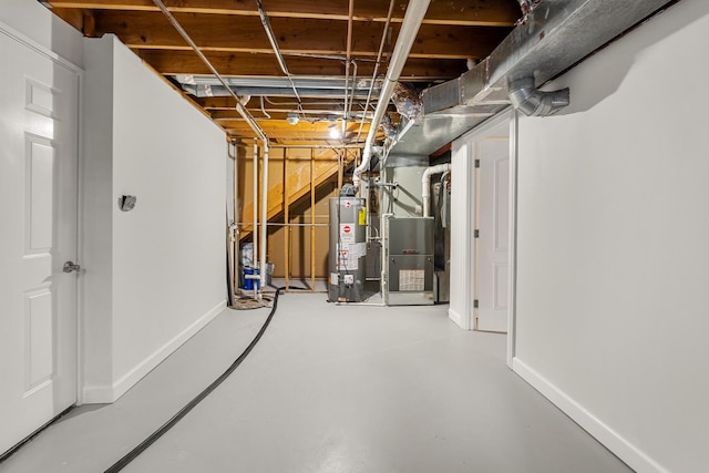 basement with heating unit and water heater