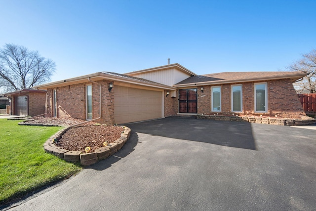 single story home with a garage