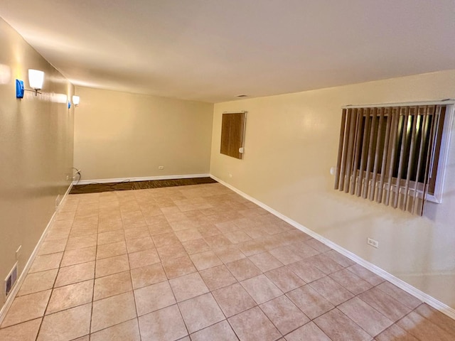 view of tiled spare room