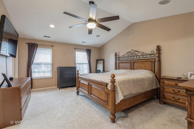 bedroom with ceiling fan, light colored carpet, and lofted ceiling