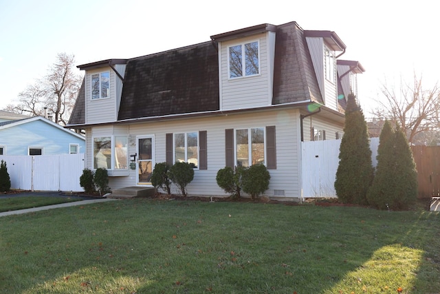 view of front of property featuring a front yard