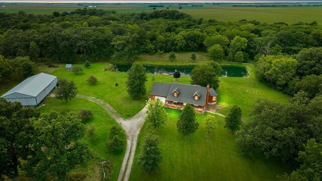 bird's eye view featuring a rural view and a water view