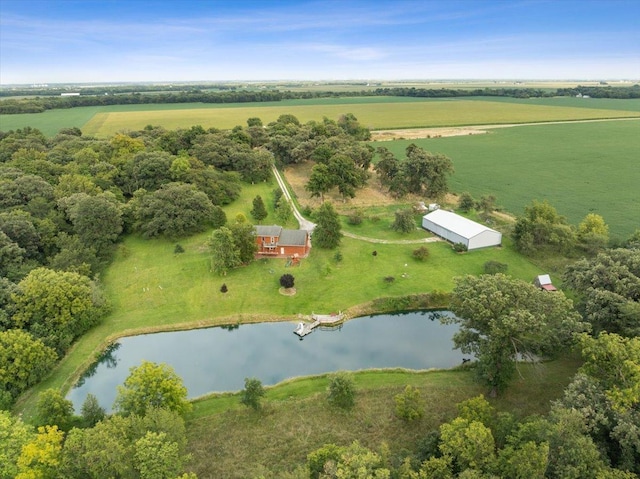 aerial view with a rural view and a water view