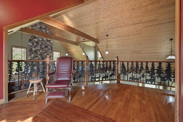 unfurnished room featuring high vaulted ceiling, beamed ceiling, wood finished floors, and wood ceiling