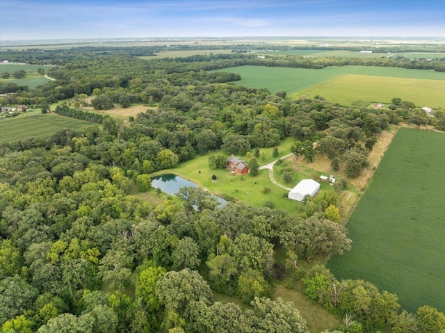 aerial view with a rural view and a water view