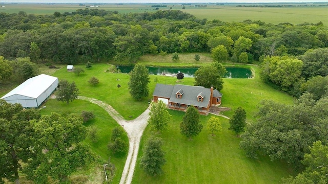 birds eye view of property with a rural view