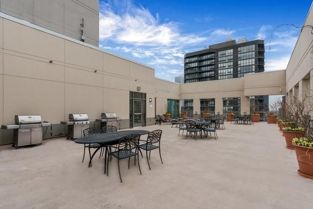 view of patio with a grill