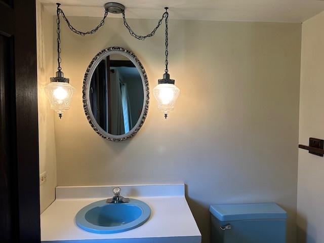 bathroom with toilet and sink